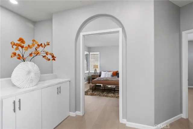 a spacious bathroom with a double sink sink mirror and bathtub