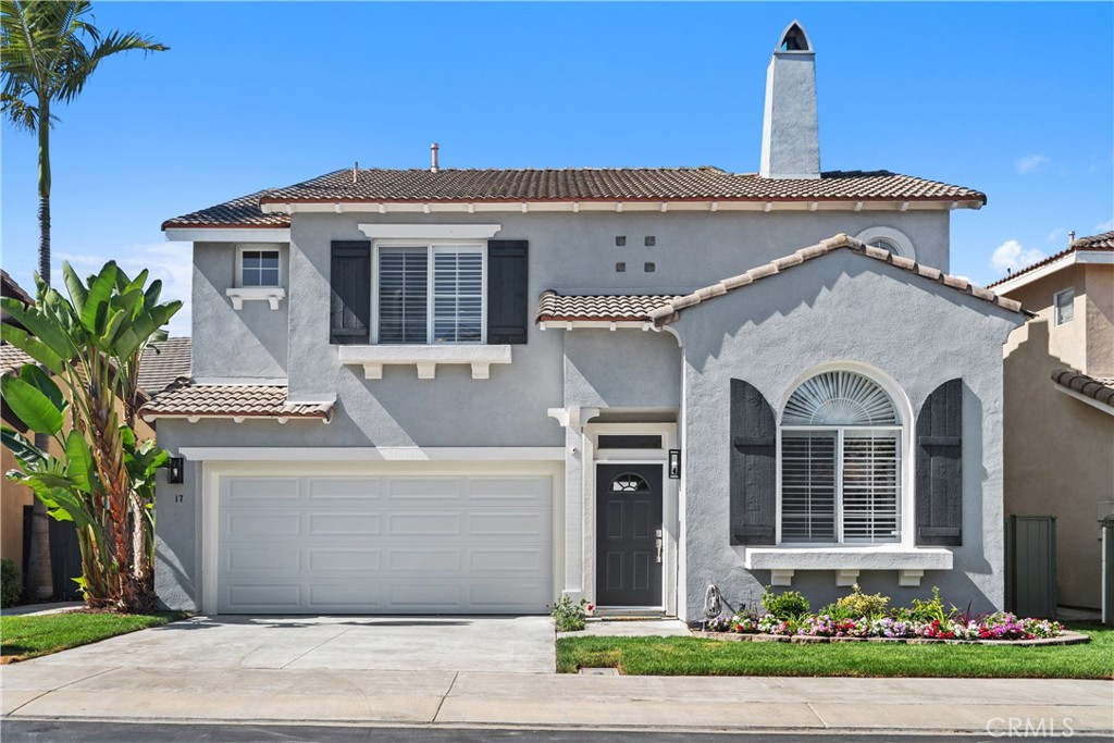 17 Nopalitos Way Aliso Viejo, CA 92656 - Photo 2 of 37 a front view of a house with a garden