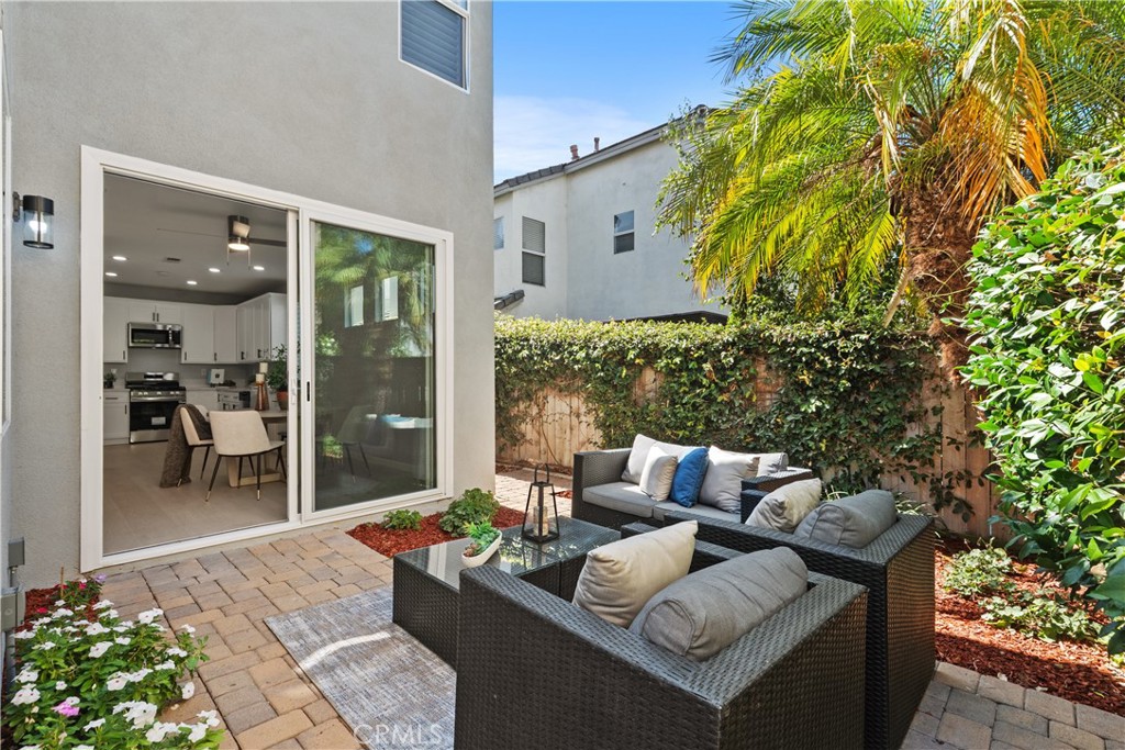 17 Nopalitos Way Aliso Viejo, CA 92656 - Photo 26 of 37 a living room with furniture and a potted plant