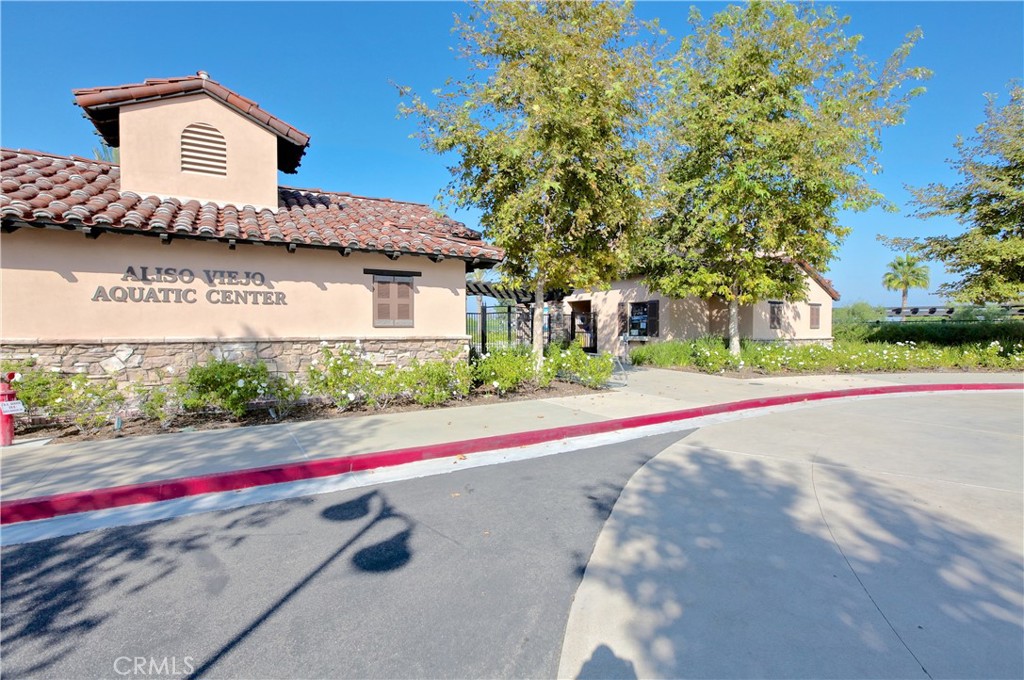 17 Nopalitos Way Aliso Viejo, CA 92656 - Photo 35 of 37 a front view of house with yard and trees around