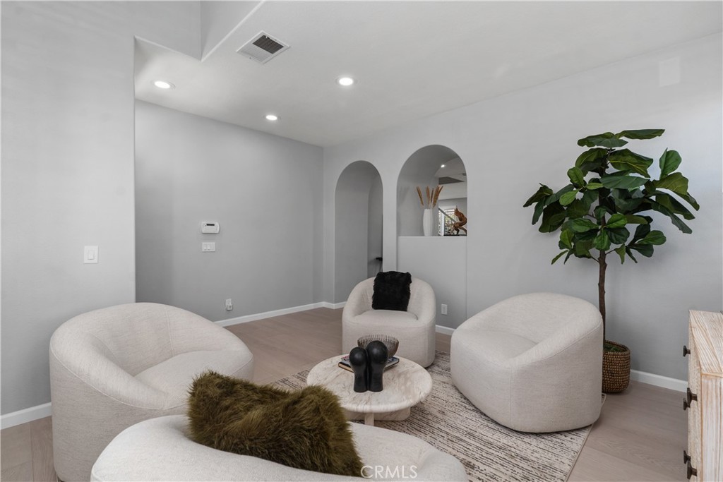 17 Nopalitos Way Aliso Viejo, CA 92656 - Photo 6 of 37 a living room with furniture and a potted plant
