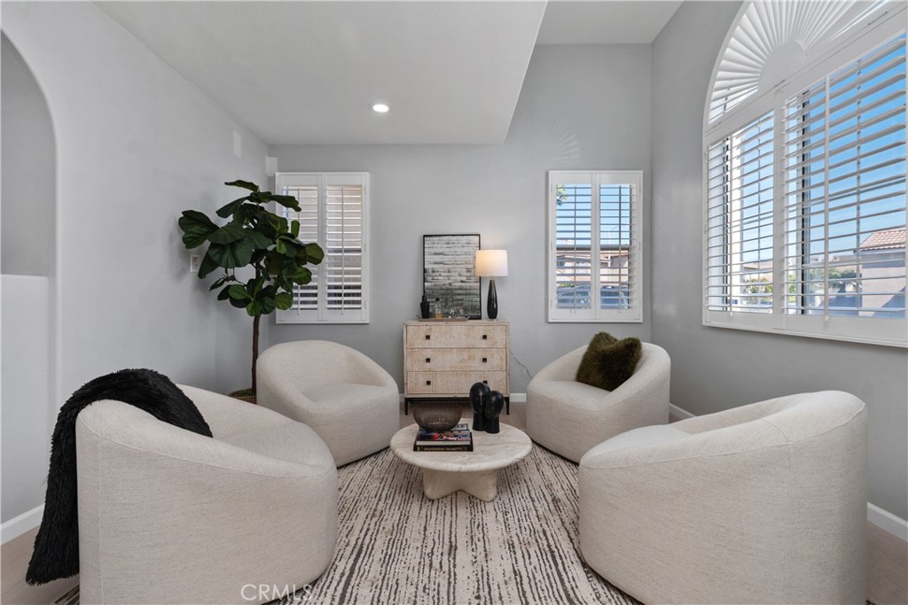 17 Nopalitos Way Aliso Viejo, CA 92656 - Photo 7 of 37 a living room with furniture and a potted plant