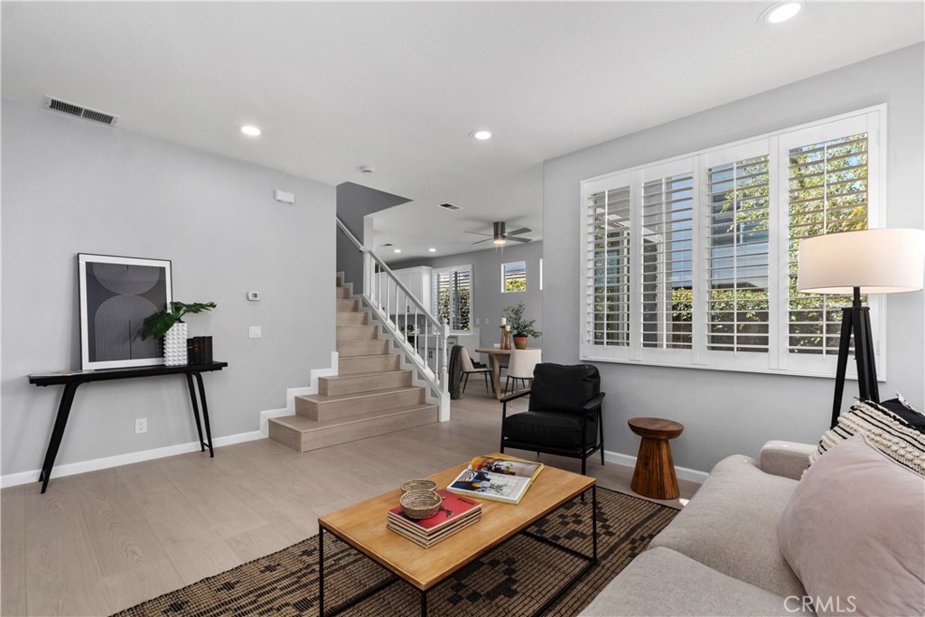 17 Nopalitos Way Aliso Viejo, CA 92656 - Photo 8 of 37 a living room with furniture and a floor to ceiling window
