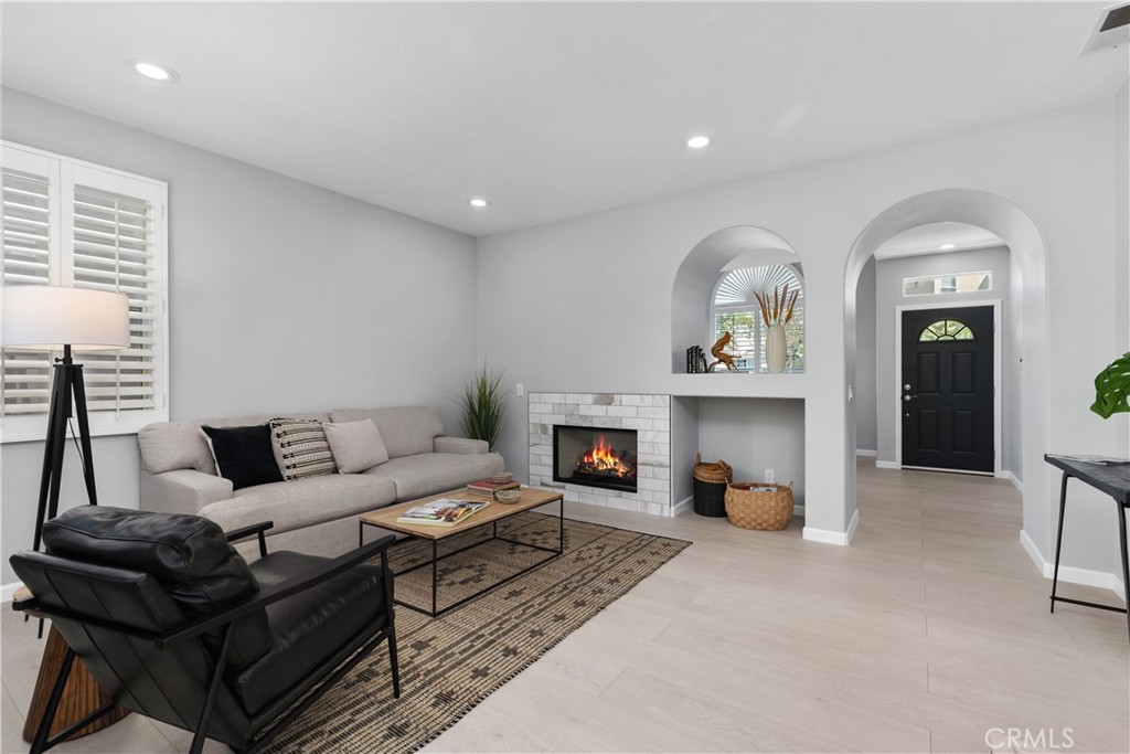 17 Nopalitos Way Aliso Viejo, CA 92656 - Photo 10 of 37 a living room with furniture and a fireplace