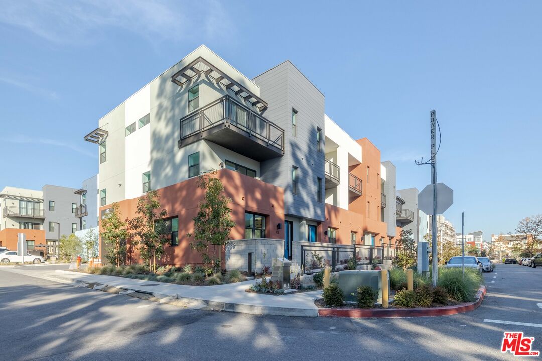434 Hudson Street Brea, CA 92821 - Photo 1 of 44 a street sign on a wall next to a road