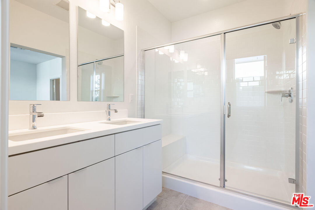 434 Hudson Street Brea, CA 92821 - Photo 41 of 44 a bathroom with a sink and a mirror