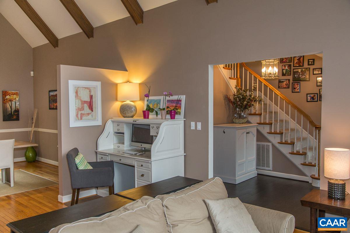 525 Rodes Drive Charlottesville, VA 22903 - Photo 7 of 40 a bedroom with furniture and a wooden floor
