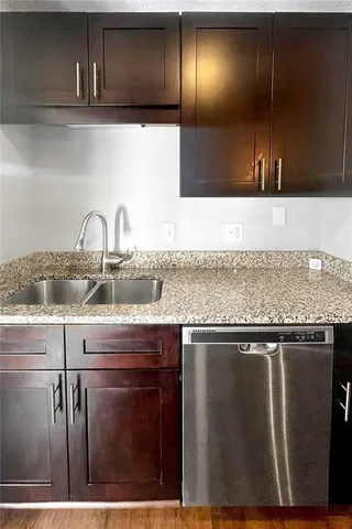 a sink with granite countertop a sink