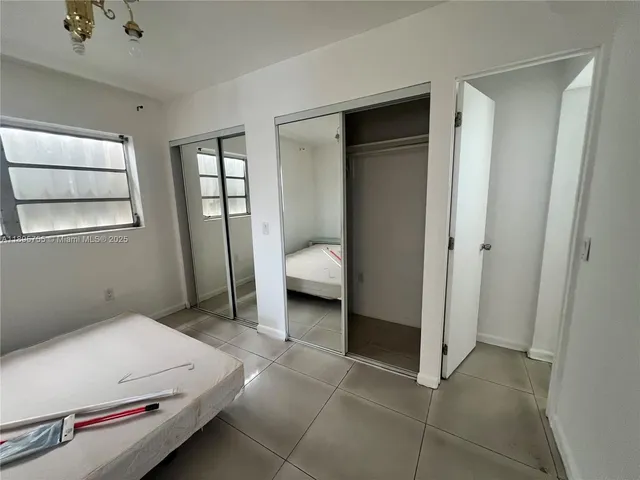 a bathroom with a toilet a sink and bathtub