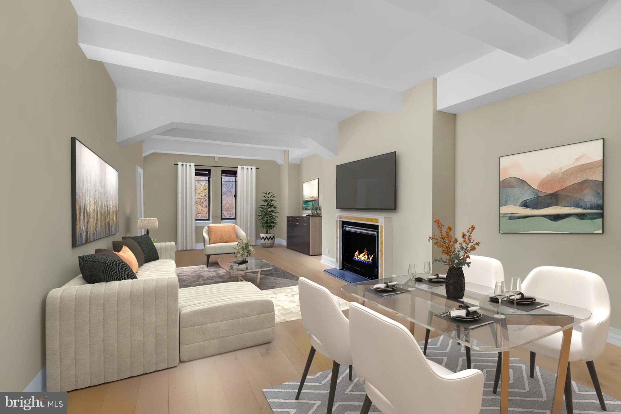 222 West Rittenhouse Square, Unit 1102 Philadelphia, PA 19103 - Photo 1 of 34 a living room with furniture a fireplace and a flat screen tv