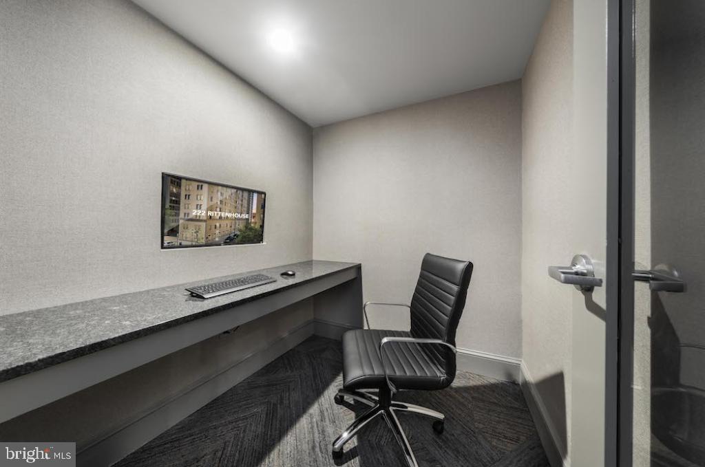 222 West Rittenhouse Square, Unit 1102 Philadelphia, PA 19103 - Photo 17 of 34 a work room with furniture and wooden floor