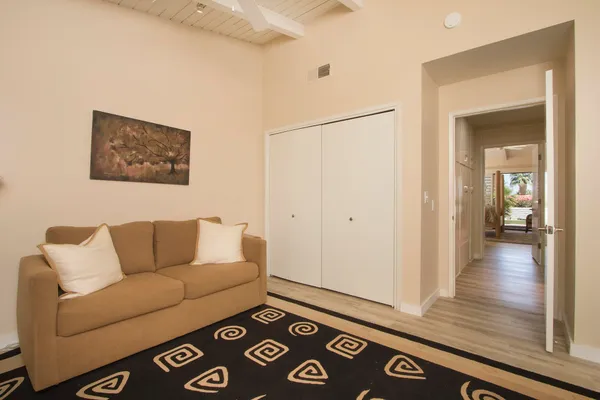 a bathroom with a shower sink and mirror