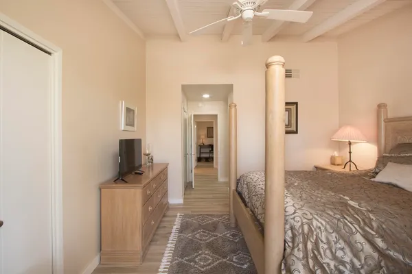 a bathroom with a sink a mirror and a toilet