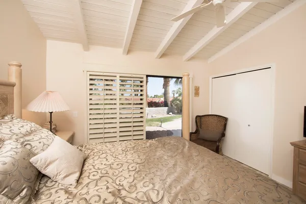 a bathroom with a shower and toilet