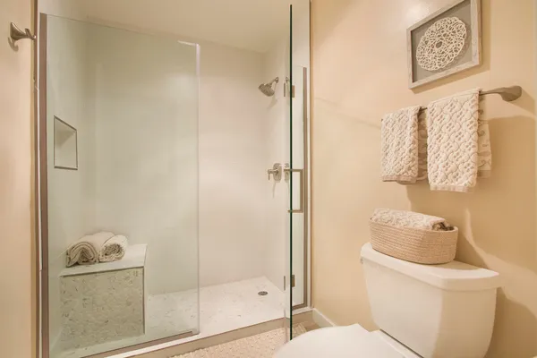 a swimming pool with some trees in the background