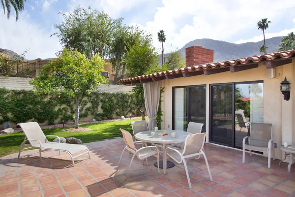 a view of a swimming pool with a patio