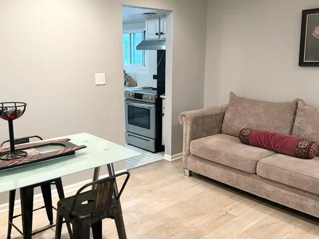a black and white bed with a black white comforter