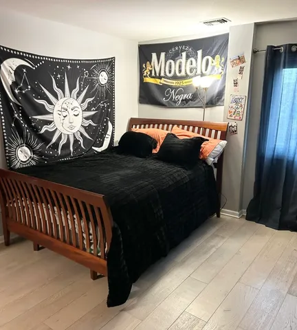 a bed room with a bed and a couch
