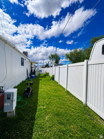 33 Apollo Way Sandy, UT 84070 - Photo 3 of 9 View of fenced backyard