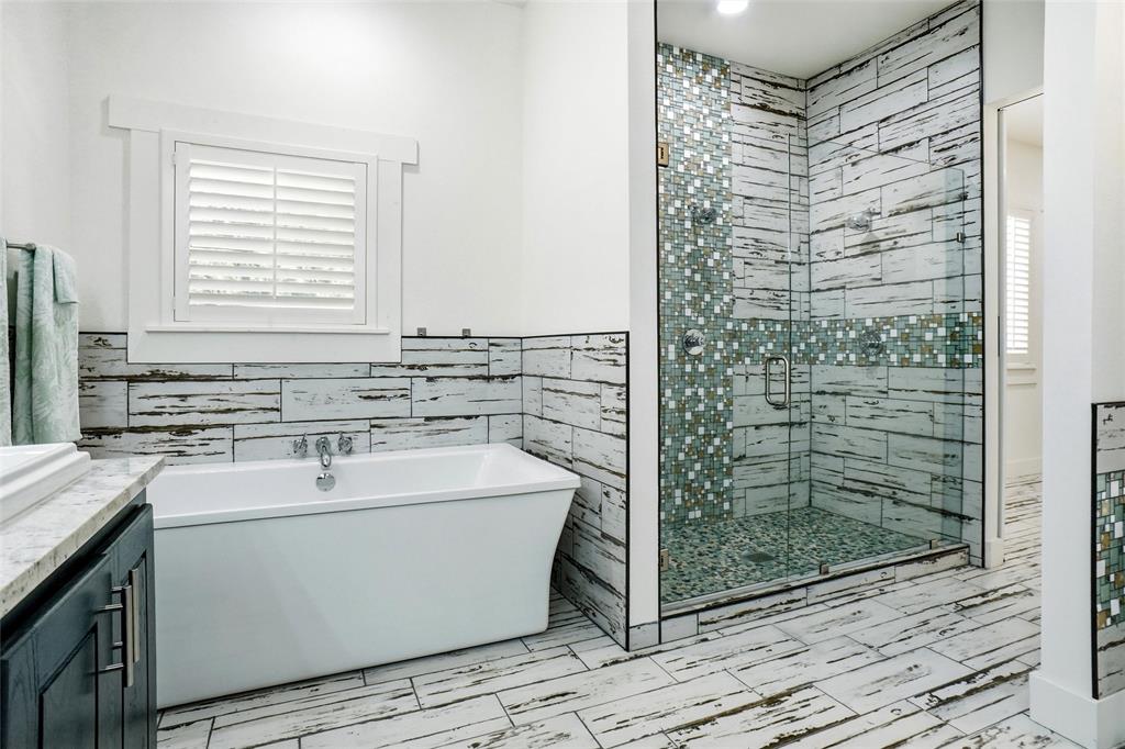 13240 Briar Road Azle, TX 76020 - Photo 16 of 39 a bathroom with a sink a toilet and shower