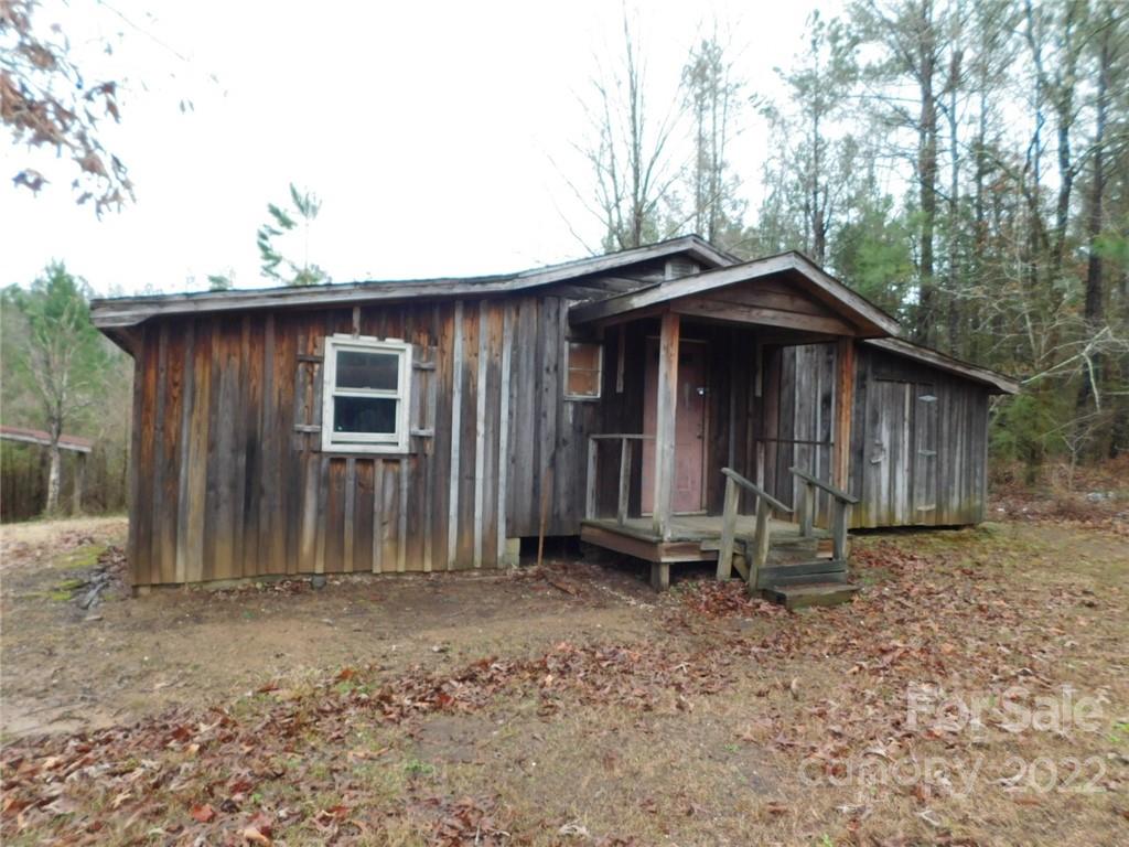 17451 White Store Road Peachland, NC 28133 - Photo 5 of 17 a front view of a house with garden