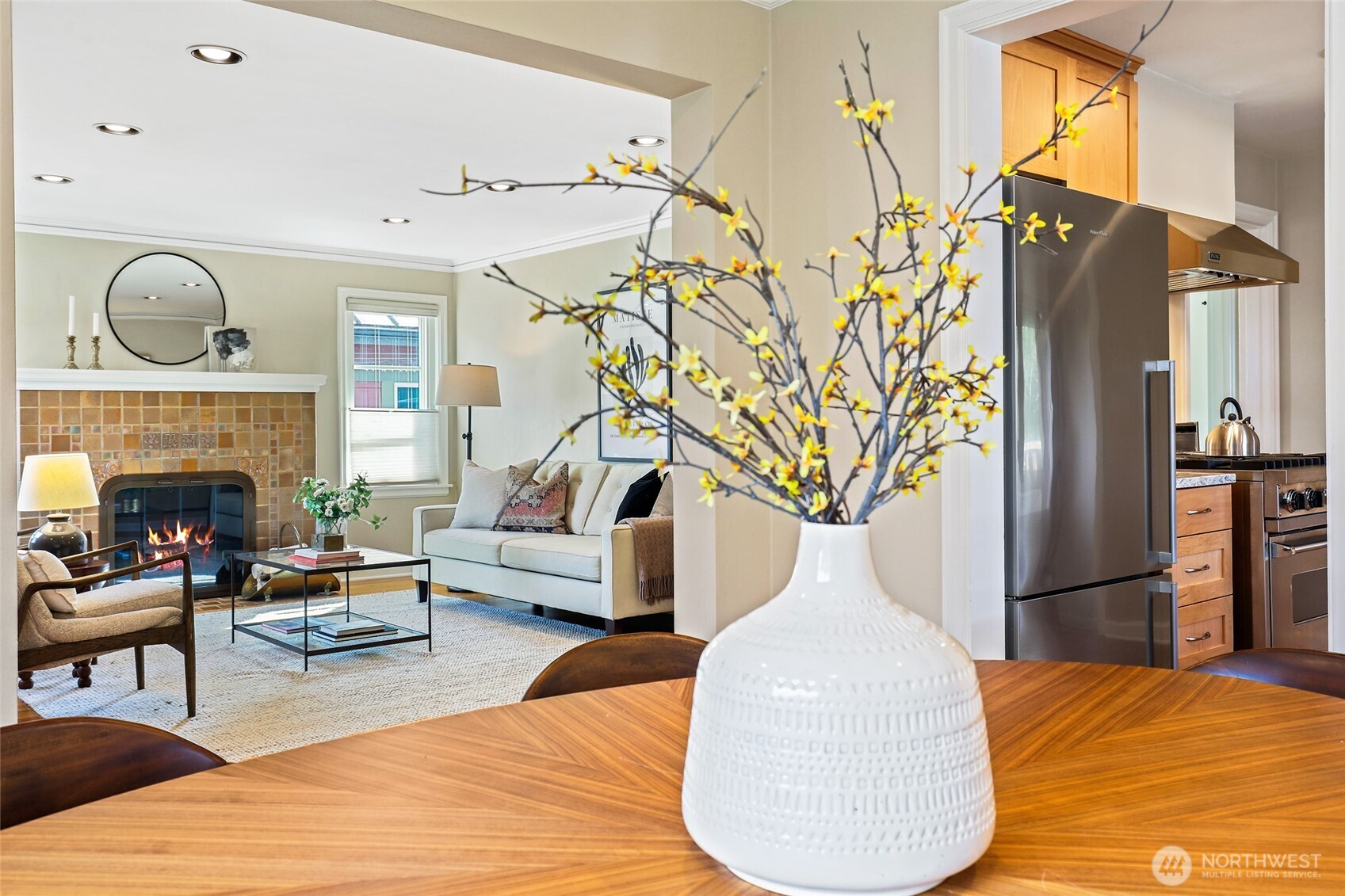 4115 Ashworth Avenue North Seattle, WA 98103 - Photo 11 of 31 a view of living room with furniture and a fireplace