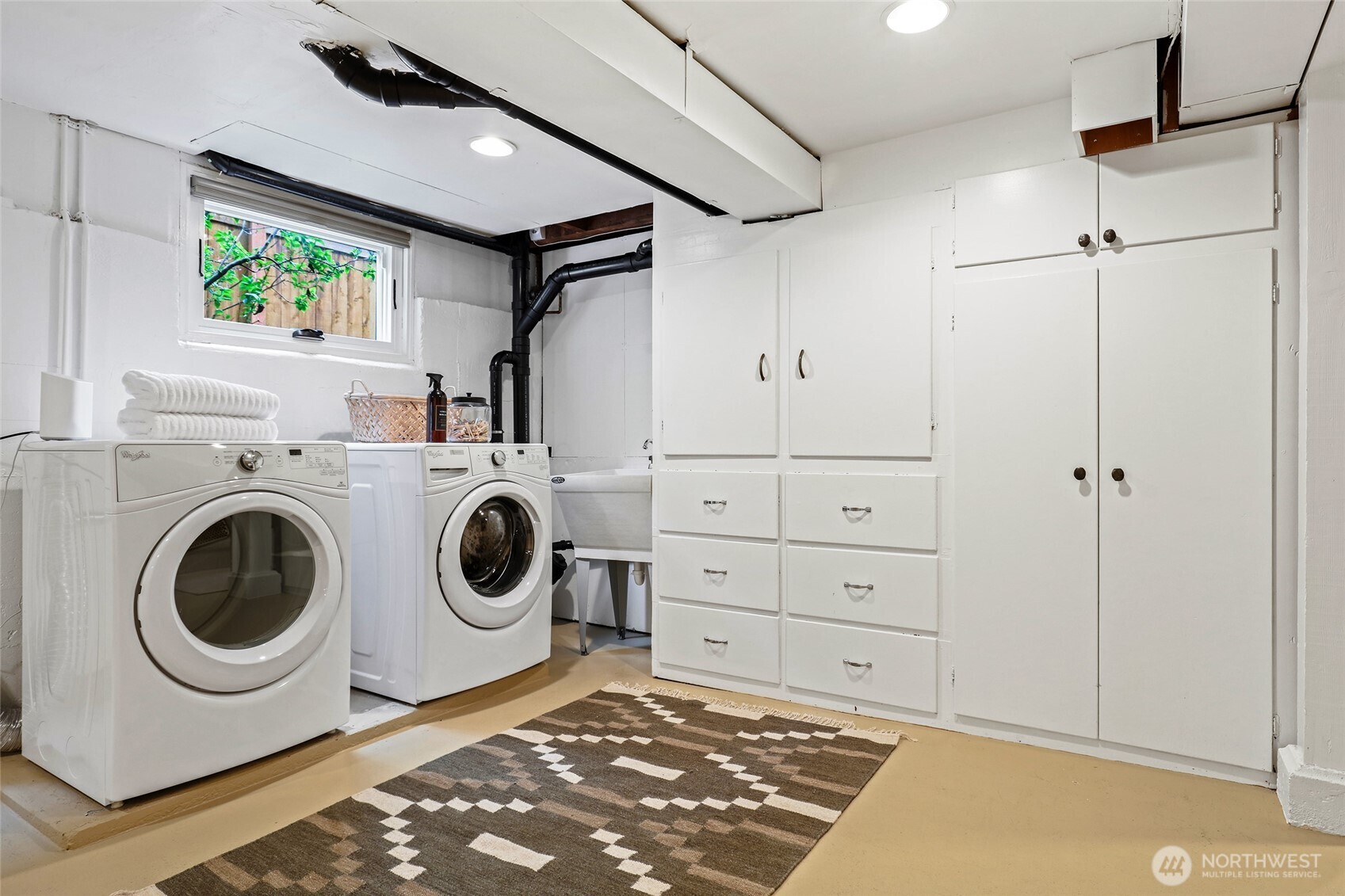 4115 Ashworth Avenue North Seattle, WA 98103 - Photo 20 of 31 a utility room with dryer and washer