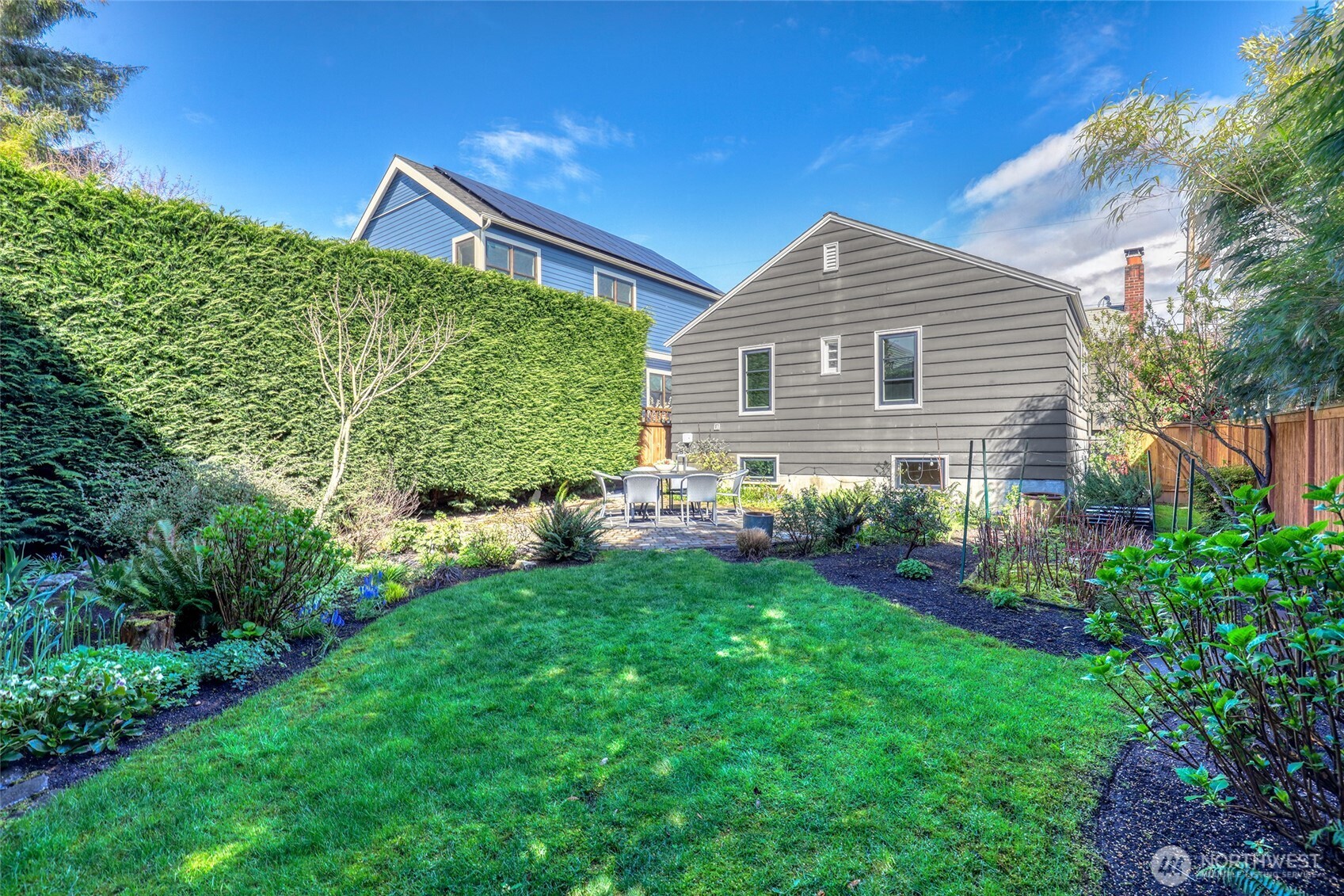 4115 Ashworth Avenue North Seattle, WA 98103 - Photo 24 of 31 a front view of a house with garden