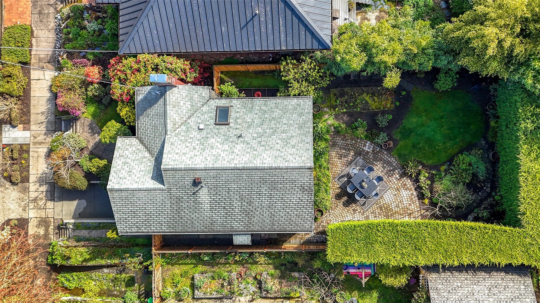 4115 Ashworth Avenue North Seattle, WA 98103 - Photo 26 of 31 an aerial view of a house having yard