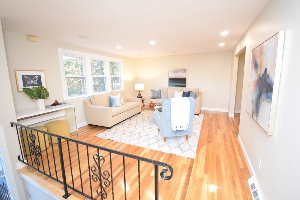 243 Hampton Road Sharon, MA 02067 - Photo 3 of 36 a living room with furniture and a table