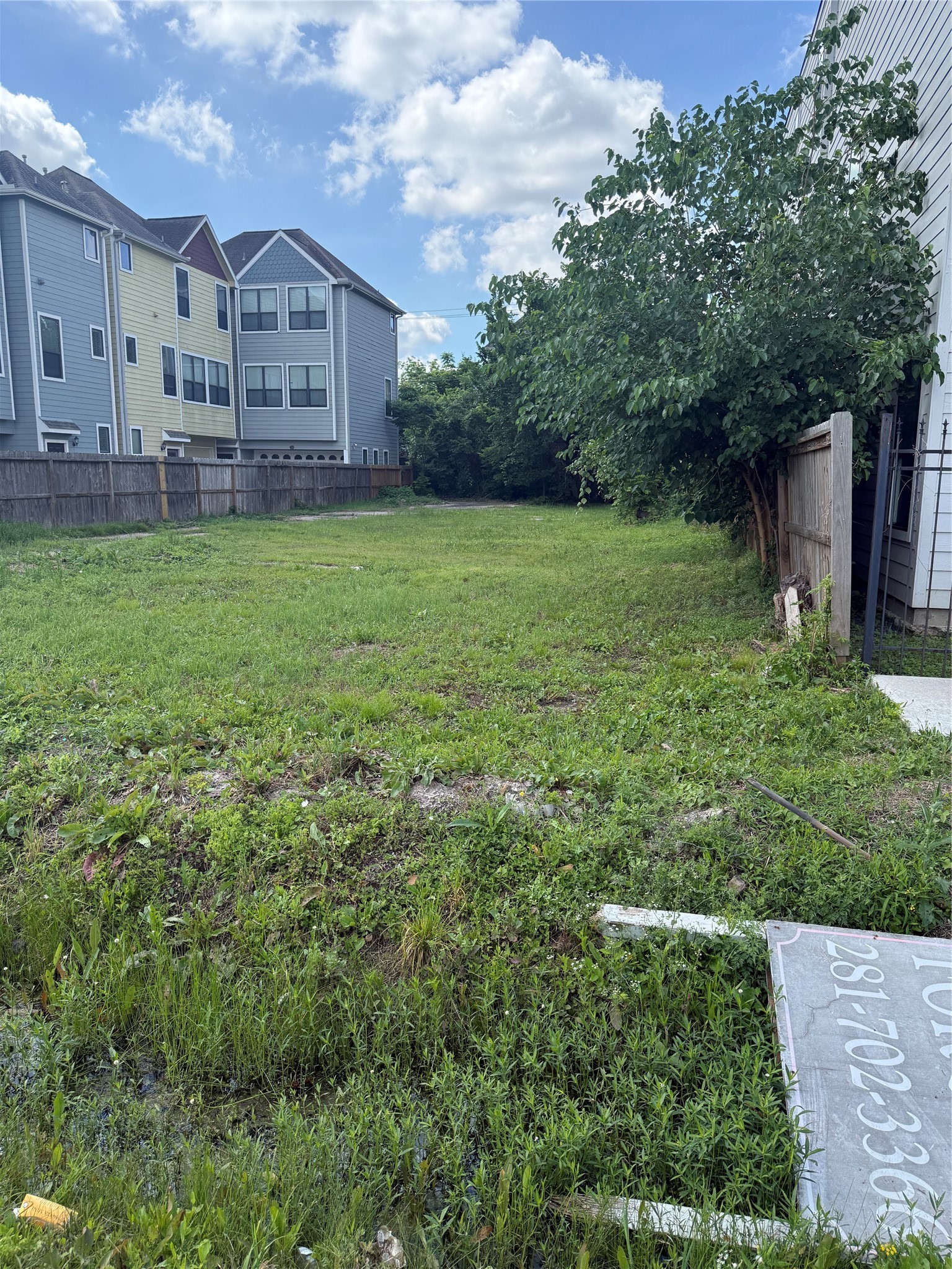 224 West 28th Street Houston, TX 77008 - Photo 2 of 13 a view of a house with a big yard and large trees