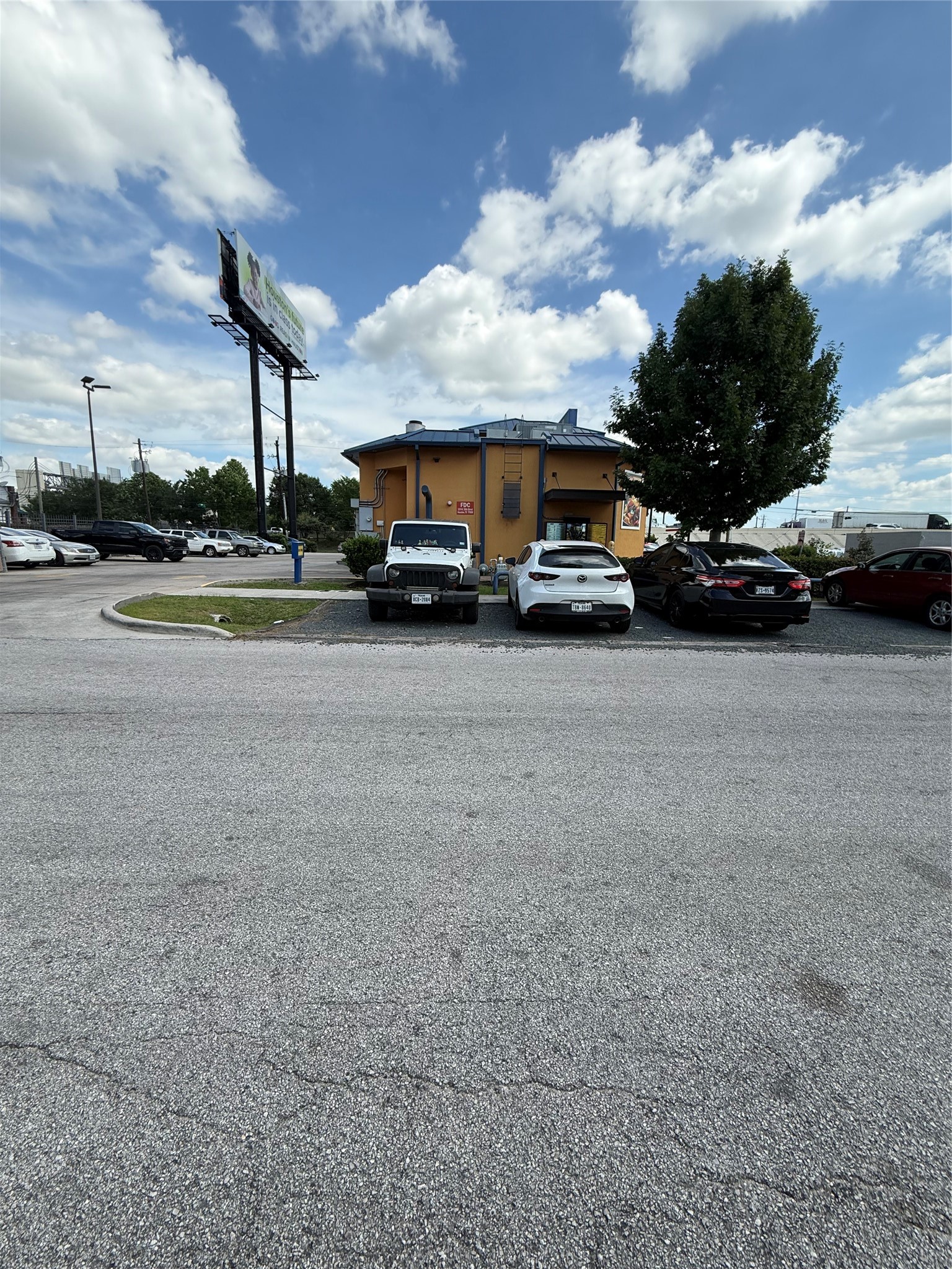 224 West 28th Street Houston, TX 77008 - Photo 9 of 13 a view of street with parked cars