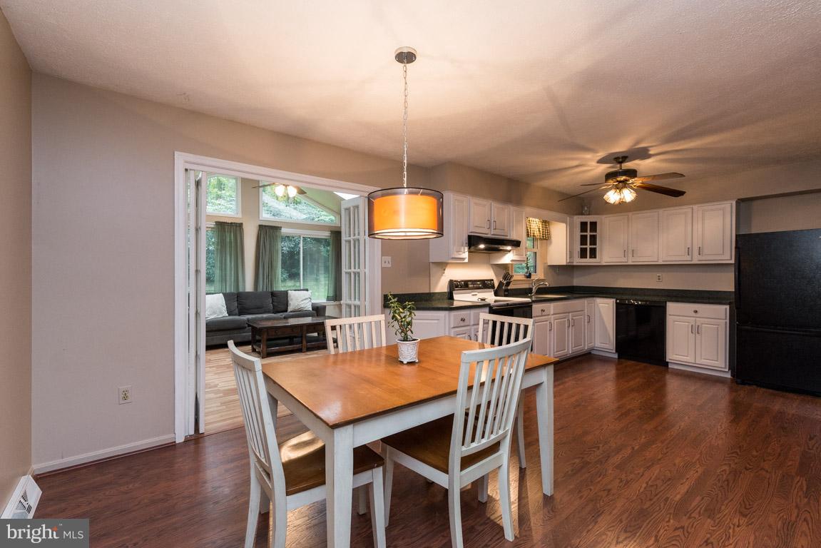 4495 Gross Mill Road Hampstead, MD 21074 - Photo 7 of 30 Dining area leads to sun room
