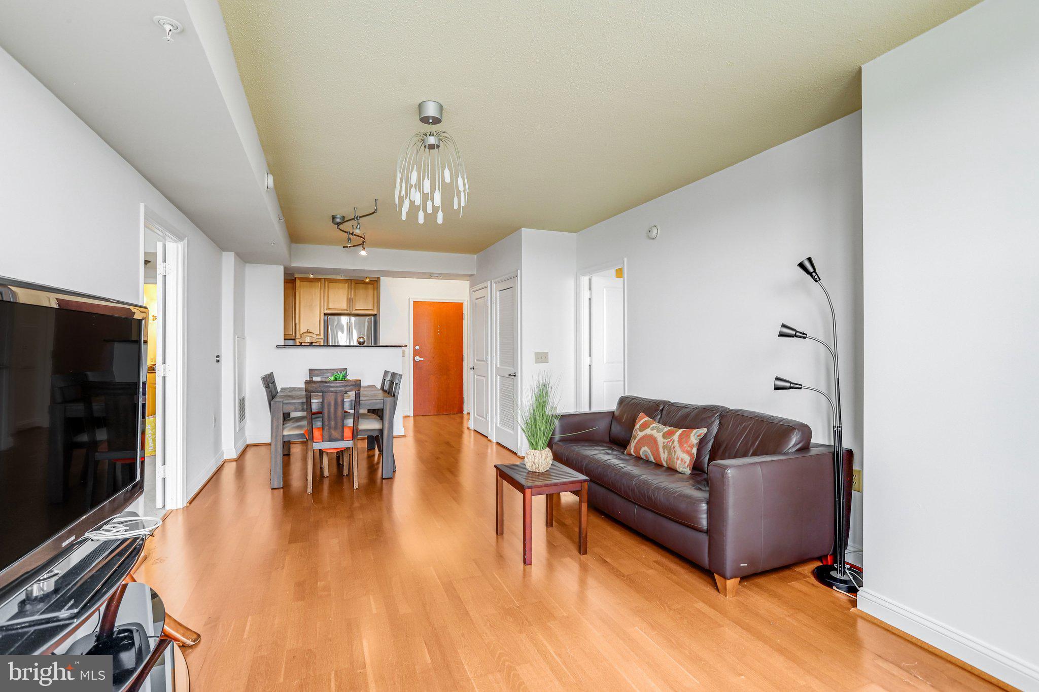 11760 Sunrise Valley Drive, Unit 415 Reston, VA 20191 - Photo 13 of 55 Living/Dining Room