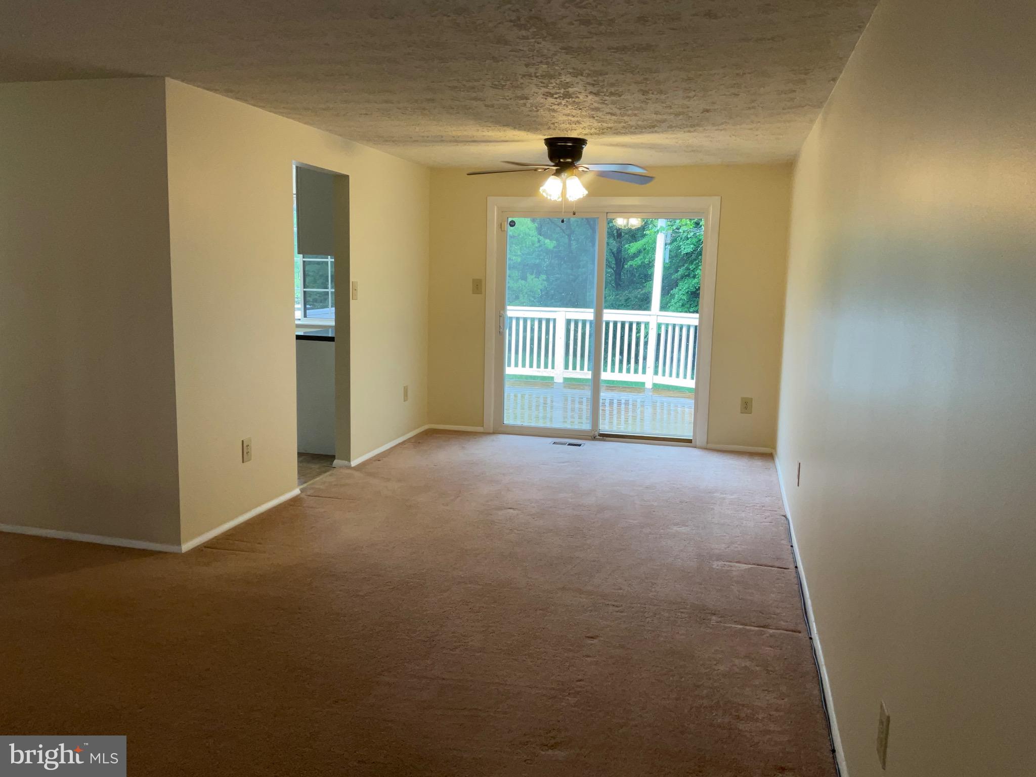 9218 Briarchip Street Laurel, MD 20708 - Photo 16 of 38 a view of an empty room with a window