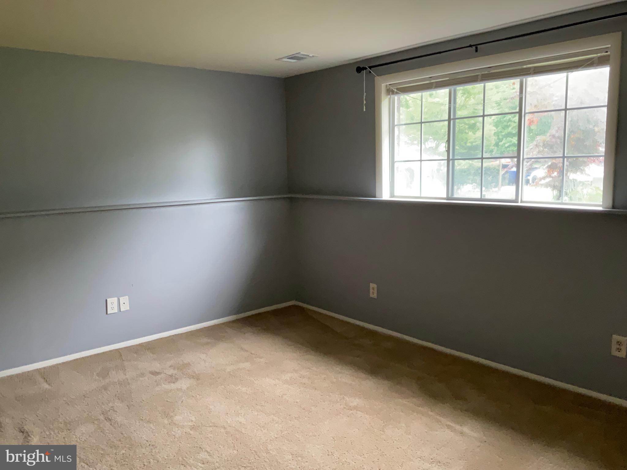 9218 Briarchip Street Laurel, MD 20708 - Photo 30 of 38 an empty room with a window