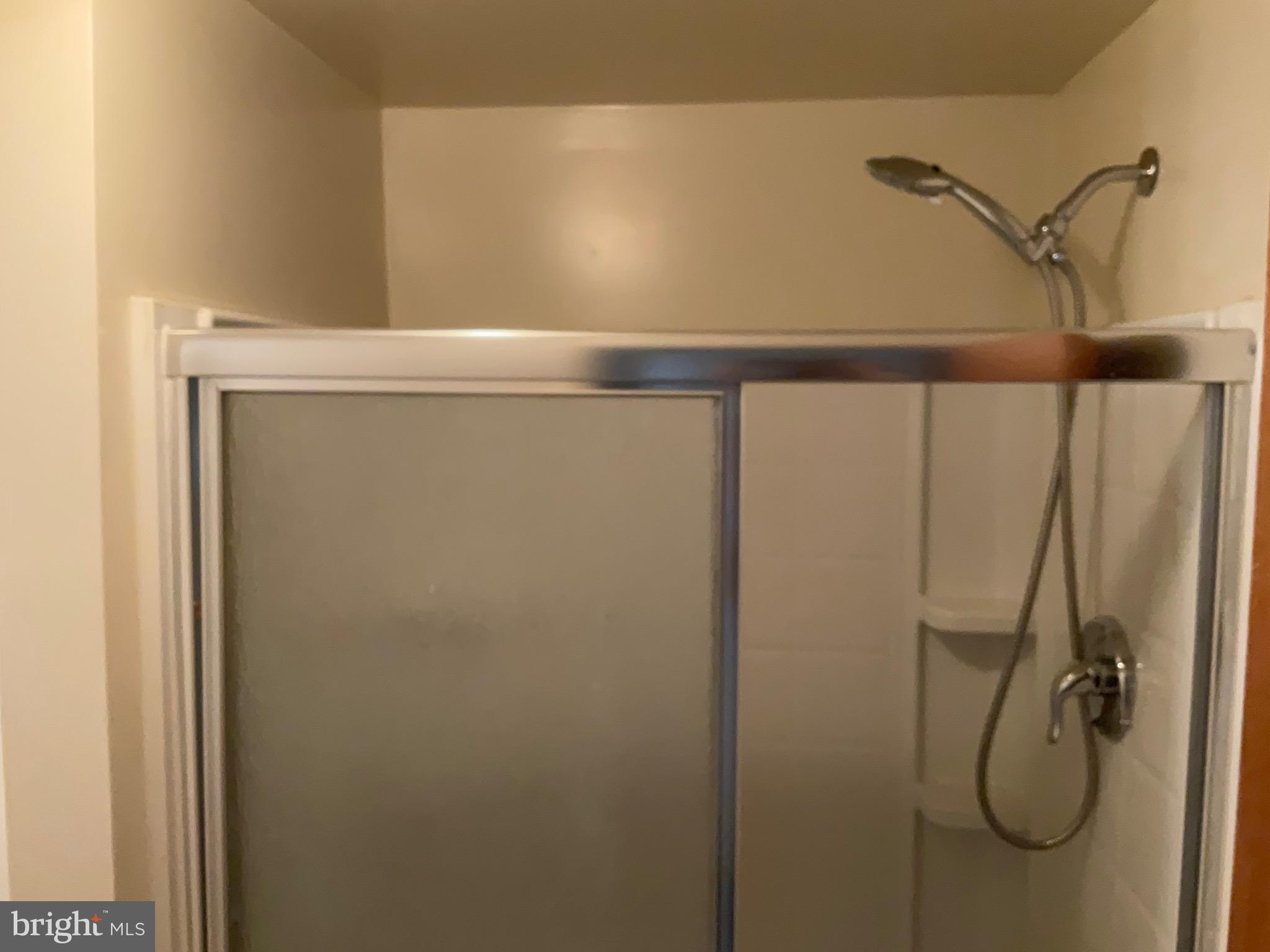 9218 Briarchip Street Laurel, MD 20708 - Photo 33 of 38 a bathroom with a shower