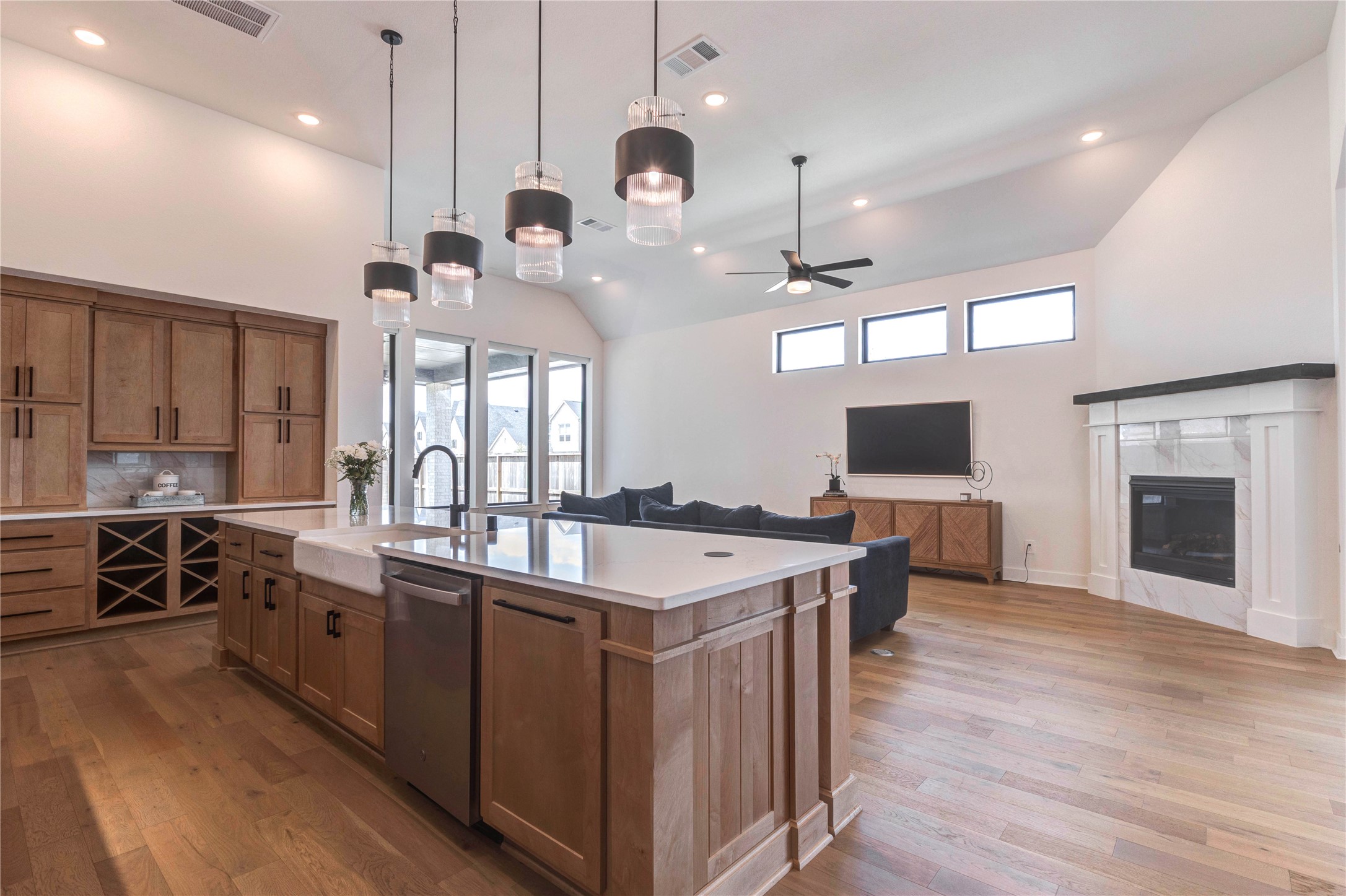 4510 Windmill Lndg Lane Fulshear, TX 77441 - Photo 47 of 48 a large kitchen with a table and chairs in it