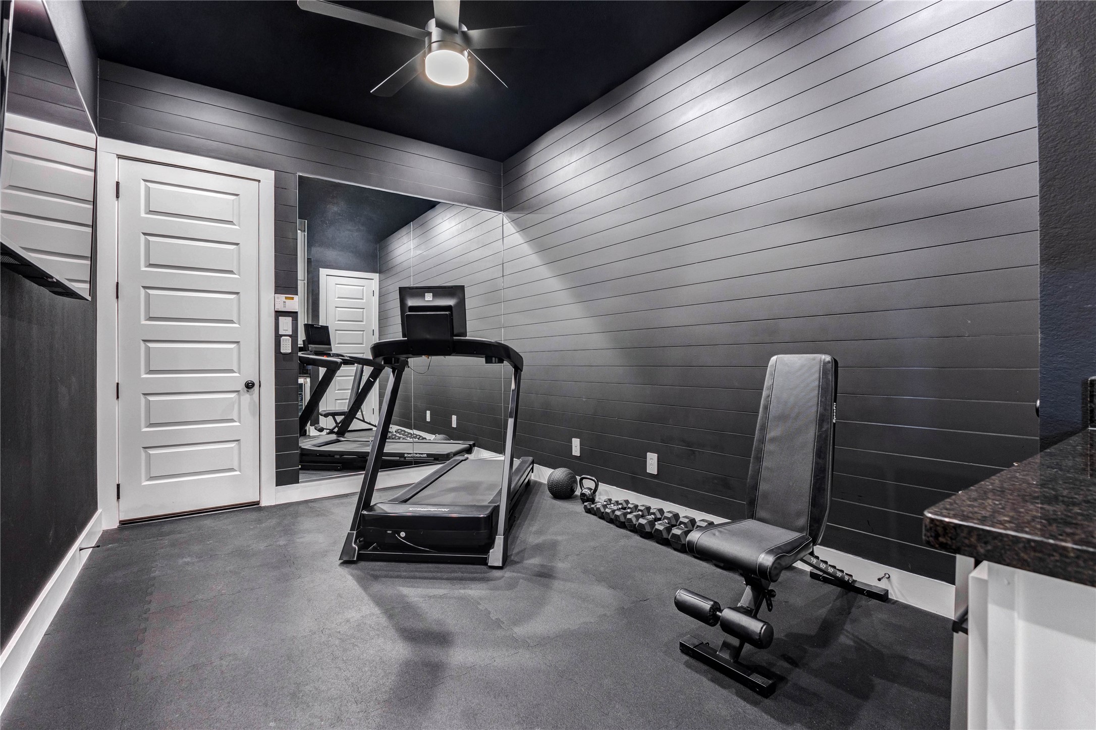 4510 Windmill Lndg Lane Fulshear, TX 77441 - Photo 19 of 48 a view of a room with gym equipment