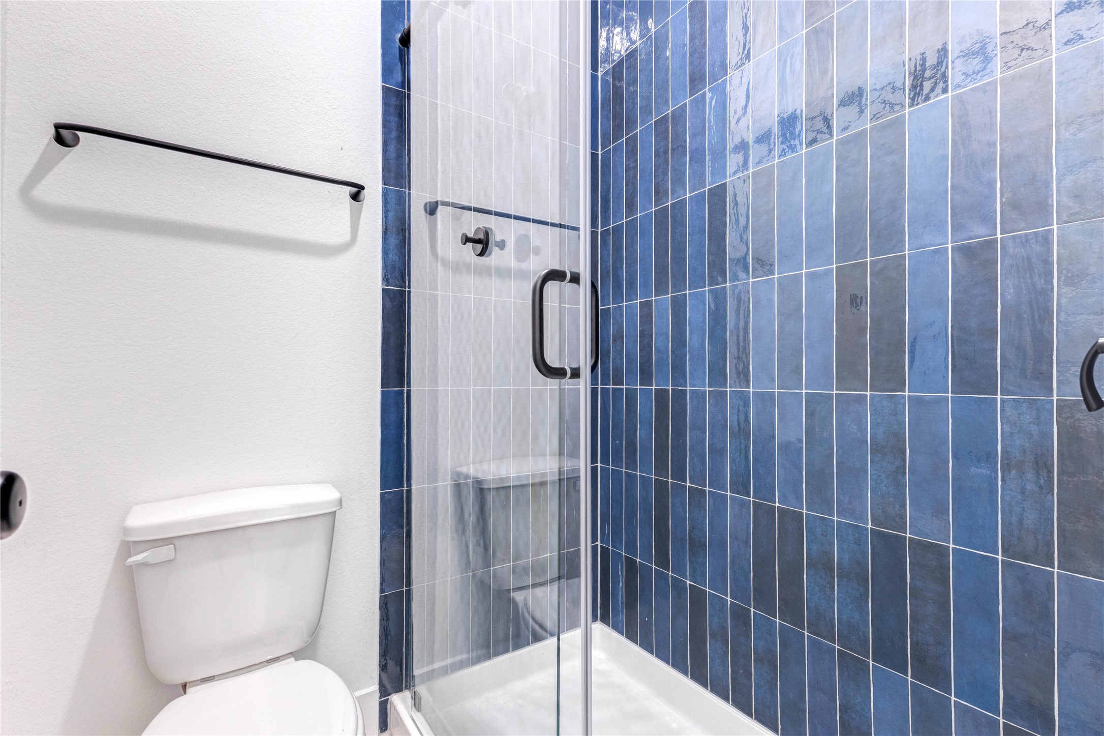 4510 Windmill Lndg Lane Fulshear, TX 77441 - Photo 22 of 48 a bathroom with a toilet and a shower