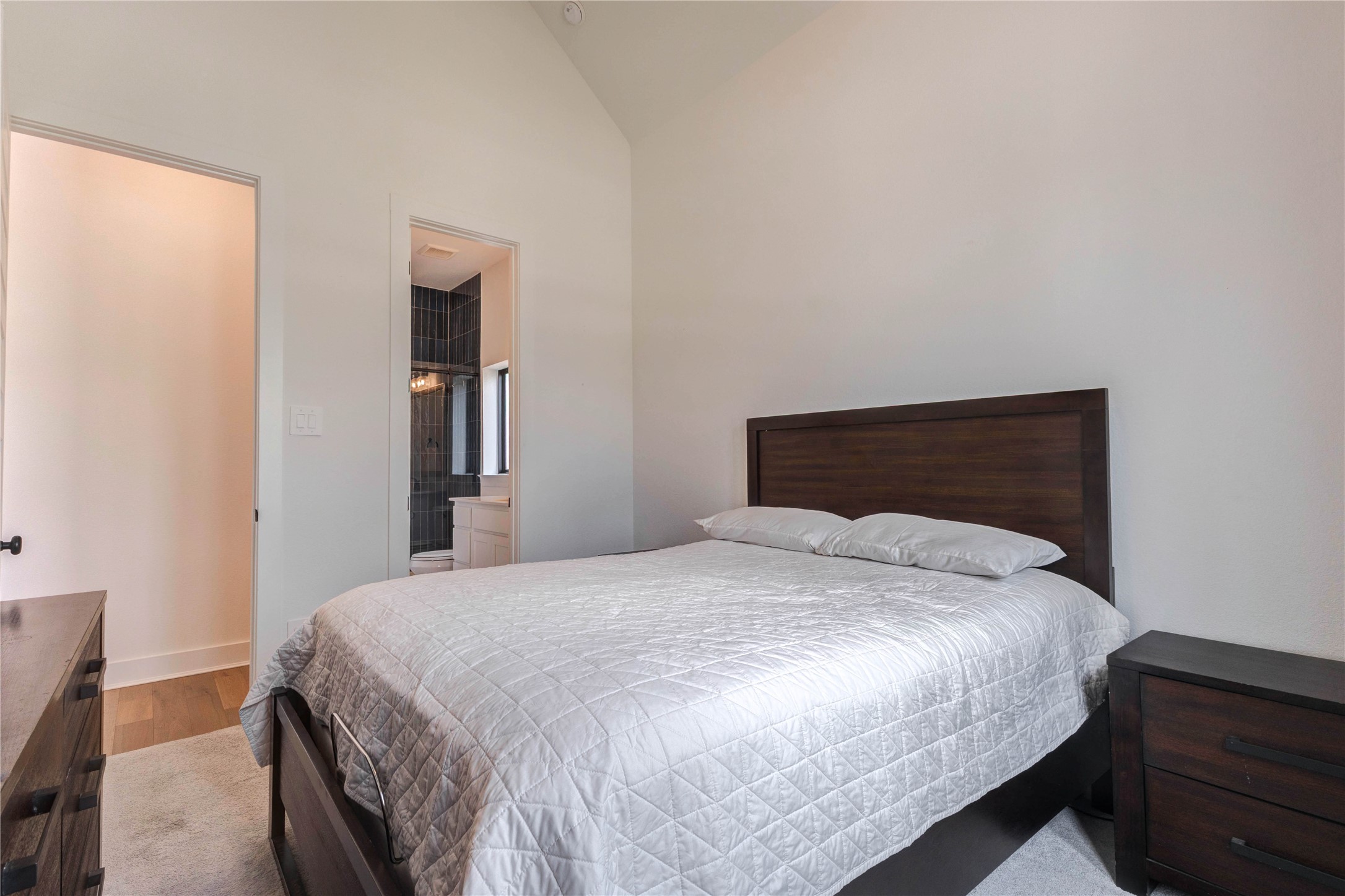 4510 Windmill Lndg Lane Fulshear, TX 77441 - Photo 23 of 48 a bedroom with a bed and a dresser