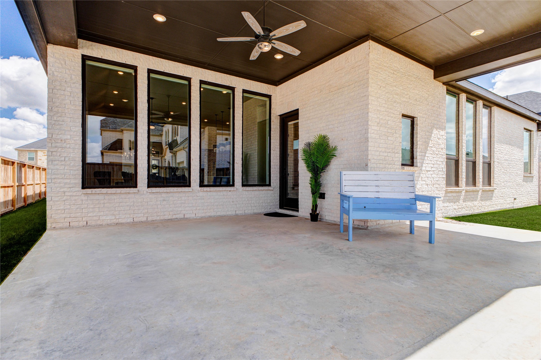 4510 Windmill Lndg Lane Fulshear, TX 77441 - Photo 42 of 48 a view of a building with porch and outdoor space
