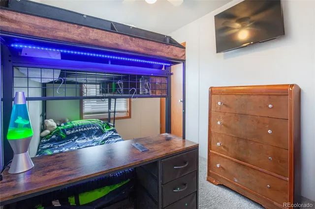 a room with a table and potted plants