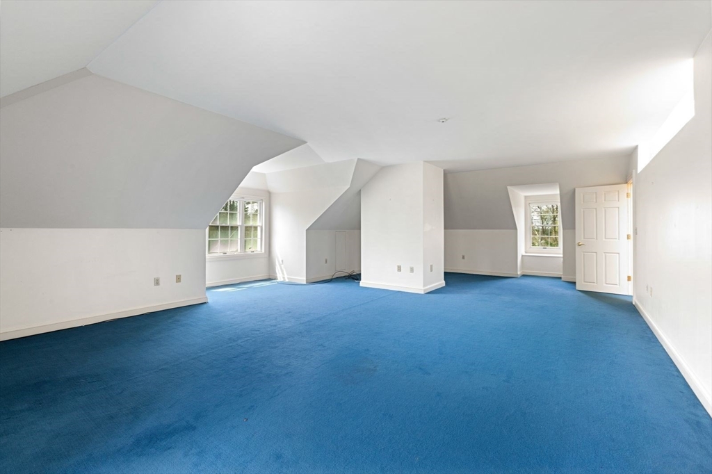 114 Farm Street Dover, MA 02030 - Photo 30 of 40 an empty room with a empty space and windows
