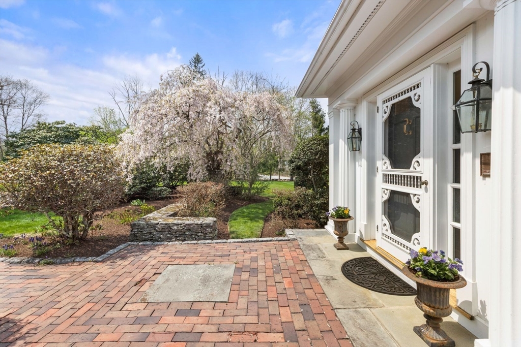 114 Farm Street Dover, MA 02030 - Photo 34 of 40 a view of a path along with potted plants