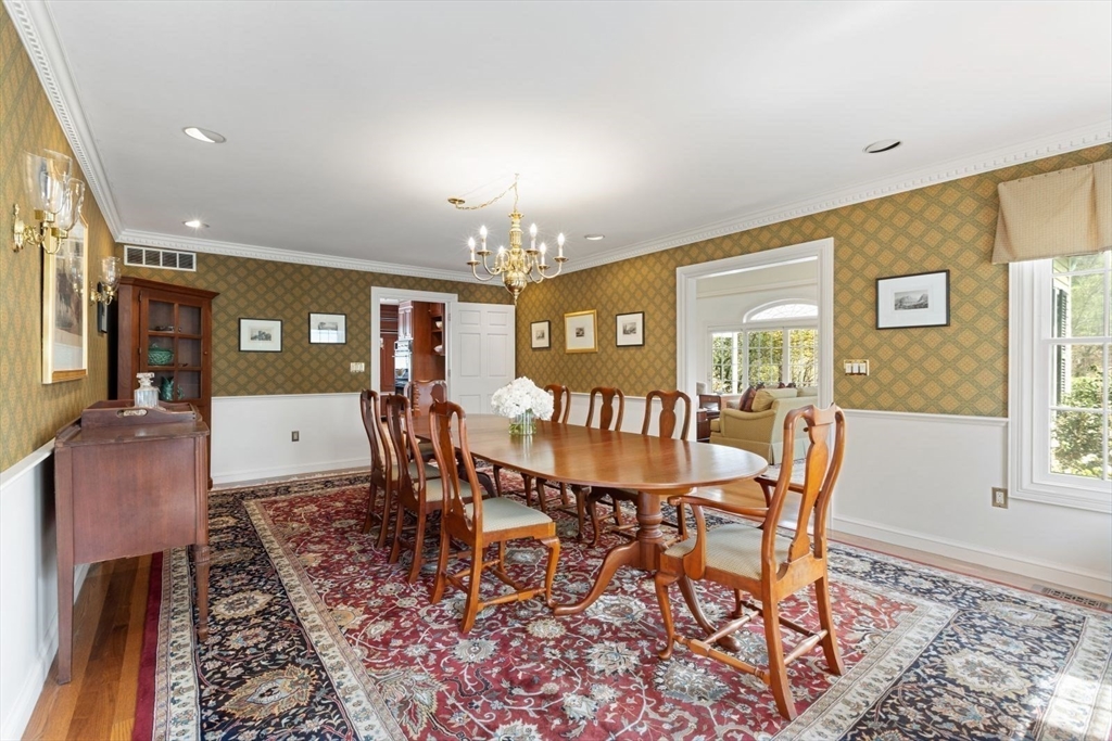114 Farm Street Dover, MA 02030 - Photo 7 of 40 a view of a dining room with furniture and a window