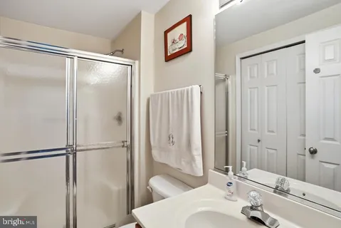 a bathroom with a tub and shower