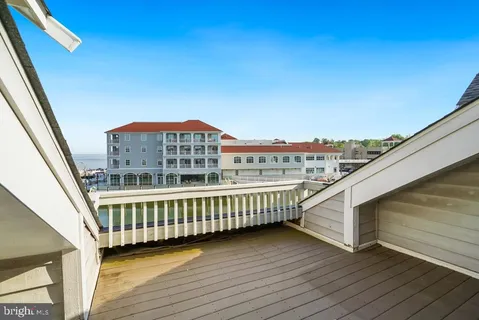 a view of balcony with furniture