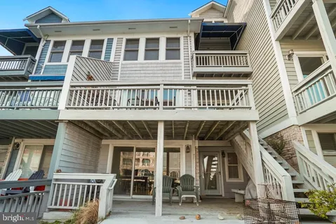 a front view of a house with a porch