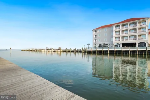 a view of a lake with building in front of it